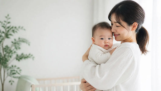 Is baby powder bad for you? A parent holding a baby in a bright, calm nursery